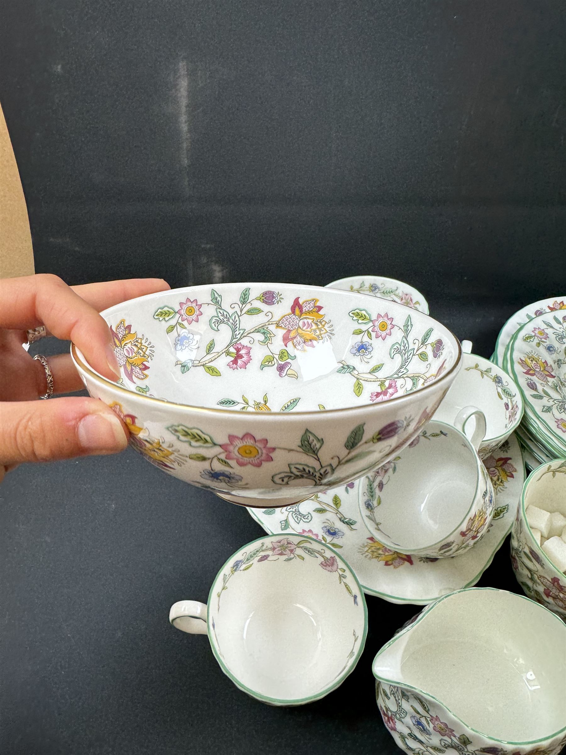 Minton Haddon Hall pattern part tea service, including milk jug, open sucrier, teacups and saucers, dessert plates etc