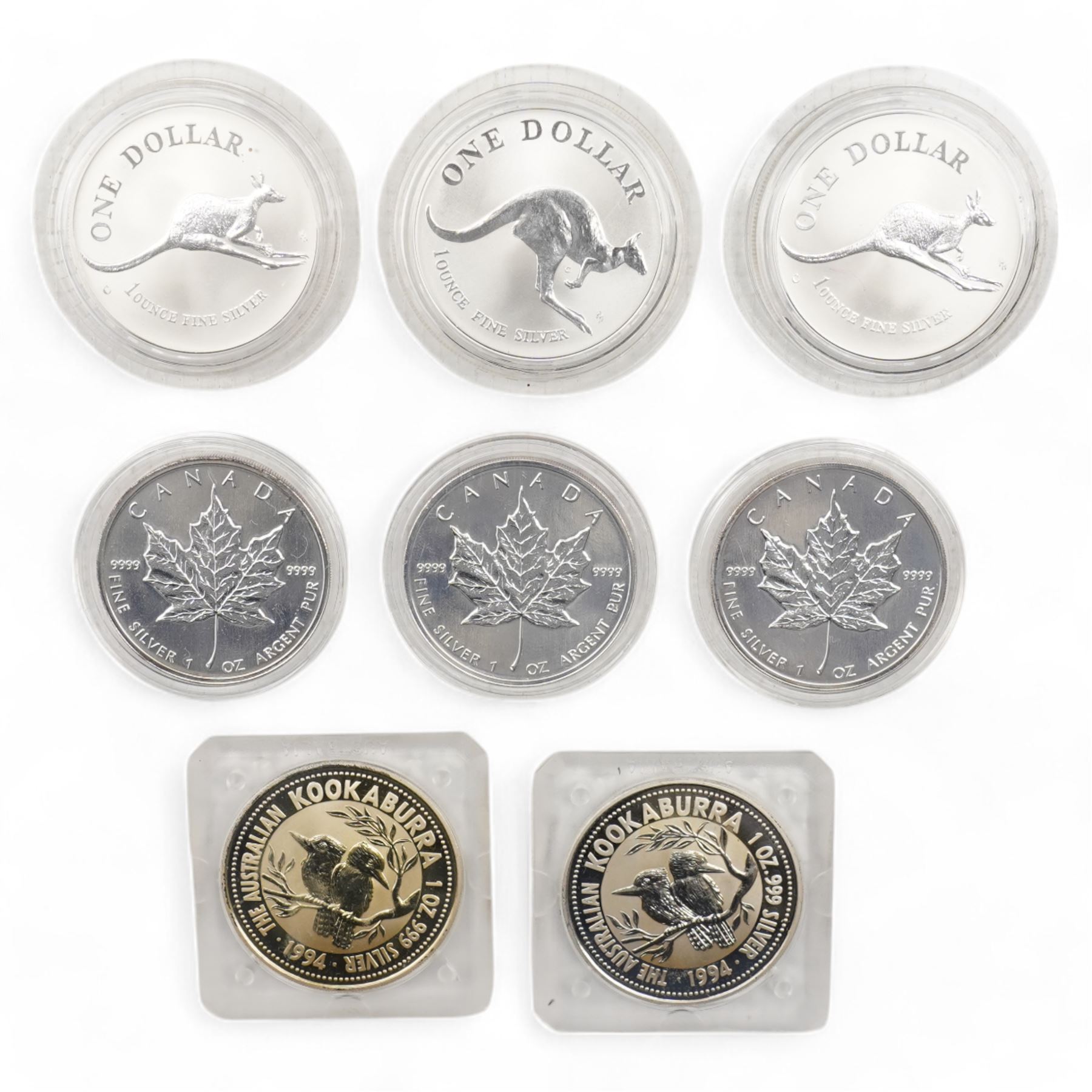 Eight Queen Elizabeth II one ounce fine silver coins, comprising Canada two 1993, one 1994 five dollars, Australia two 1994 Kookaburras, 1993 and two 1994 one dollar Kangaroos (8)