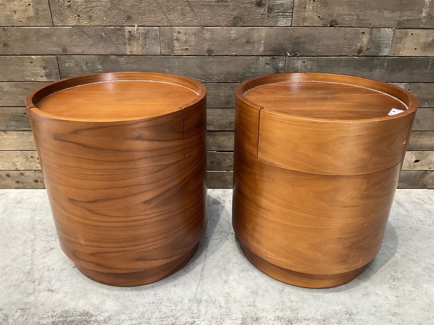 Pair of walnut circular barrel shaped lamp tables, fitted with single drawer