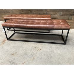 Two rectangular metal framed benches, upholstered in buttoned tan leather