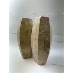 Pair of fossilised coral mosaic vases, of hexagonal form, H46cm