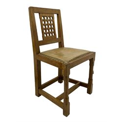 Rabbitman - set of six (5+1) oak dining chairs, pierced and carved lattice back, leather upholstered seat with stud band, on octagonal supports united by stretchers, carved with rabbit signature, by Peter Heap of Wetwang 