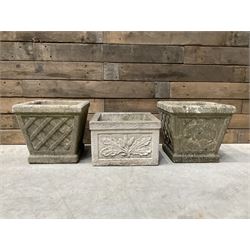 Pair of square cast stone planters, single planter with leaf decoration and a rectangular brick effect planter (4)