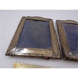 Four silver mounted photograph frames, comprising pair of early 20th century examples, and two smaller modern examples, all hallmarked, tallest H19cm