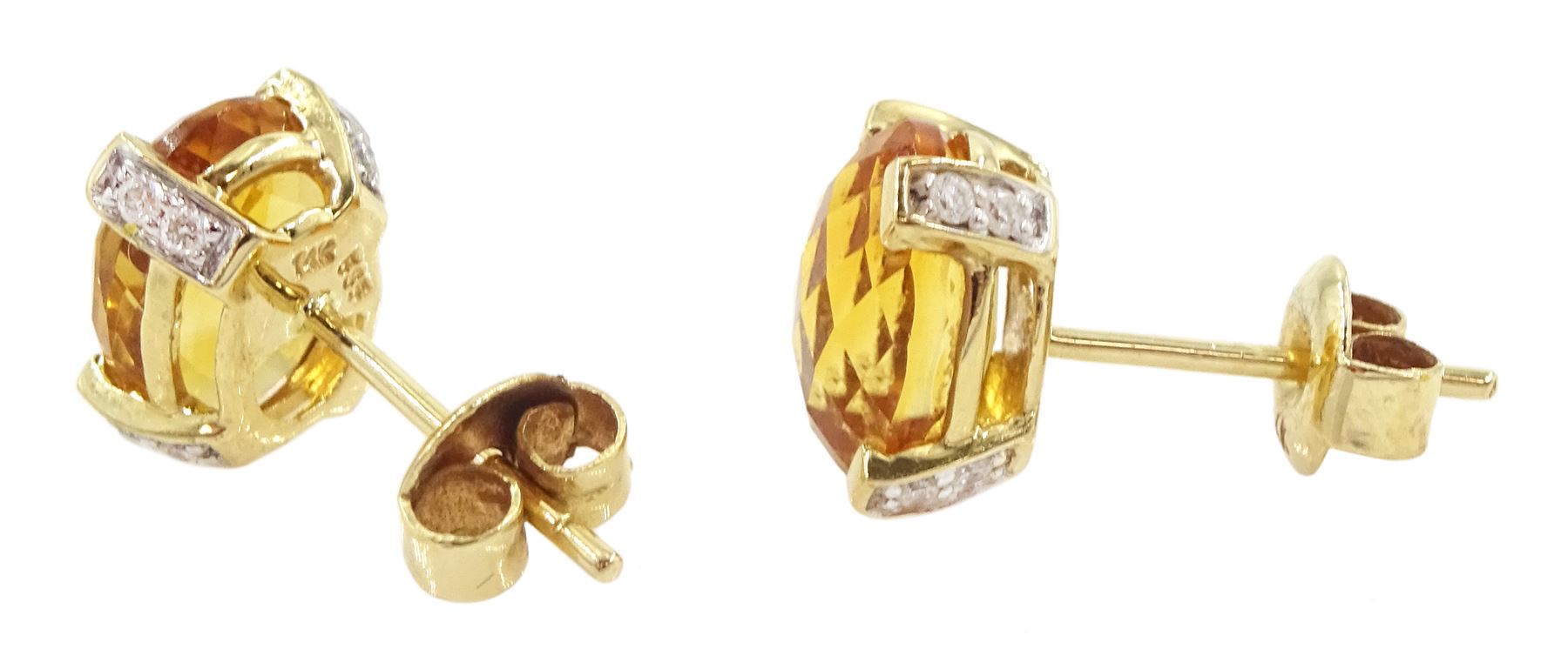 Pair of 14ct gold citrine and diamond stud earrings, oval briolite cut citrines, each claw set with two round brilliant cut diamonds, stamped 585