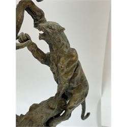 After Charles Marion Russell; Bronzed sculpture depicting man on horseback fighting a mountain lion, H42cm