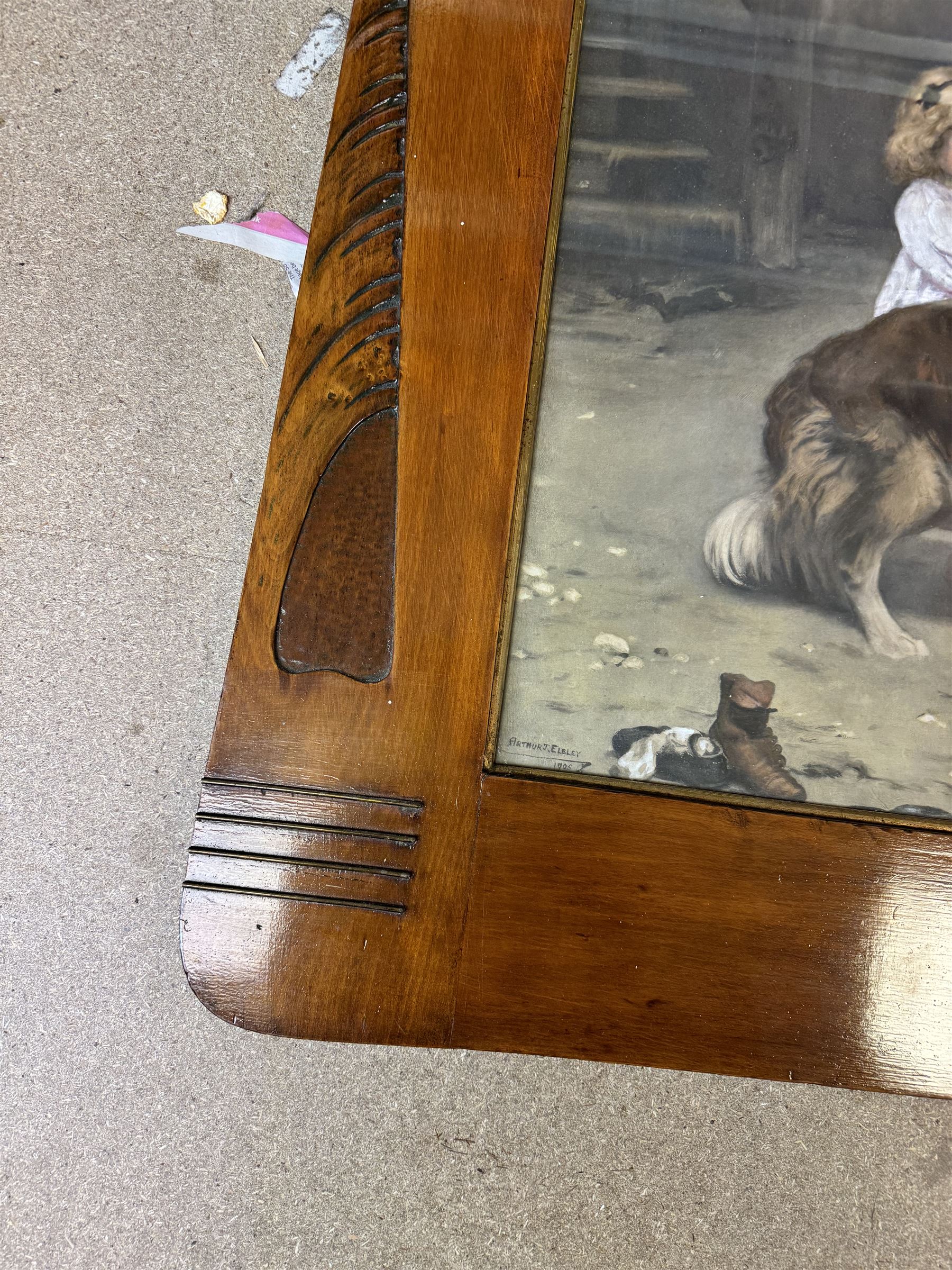 Arts and Crafts Motto frame, circa 1900, inlaid with an oval plaque depicting a cottage, two inlaid motto panels with title inlaid below 