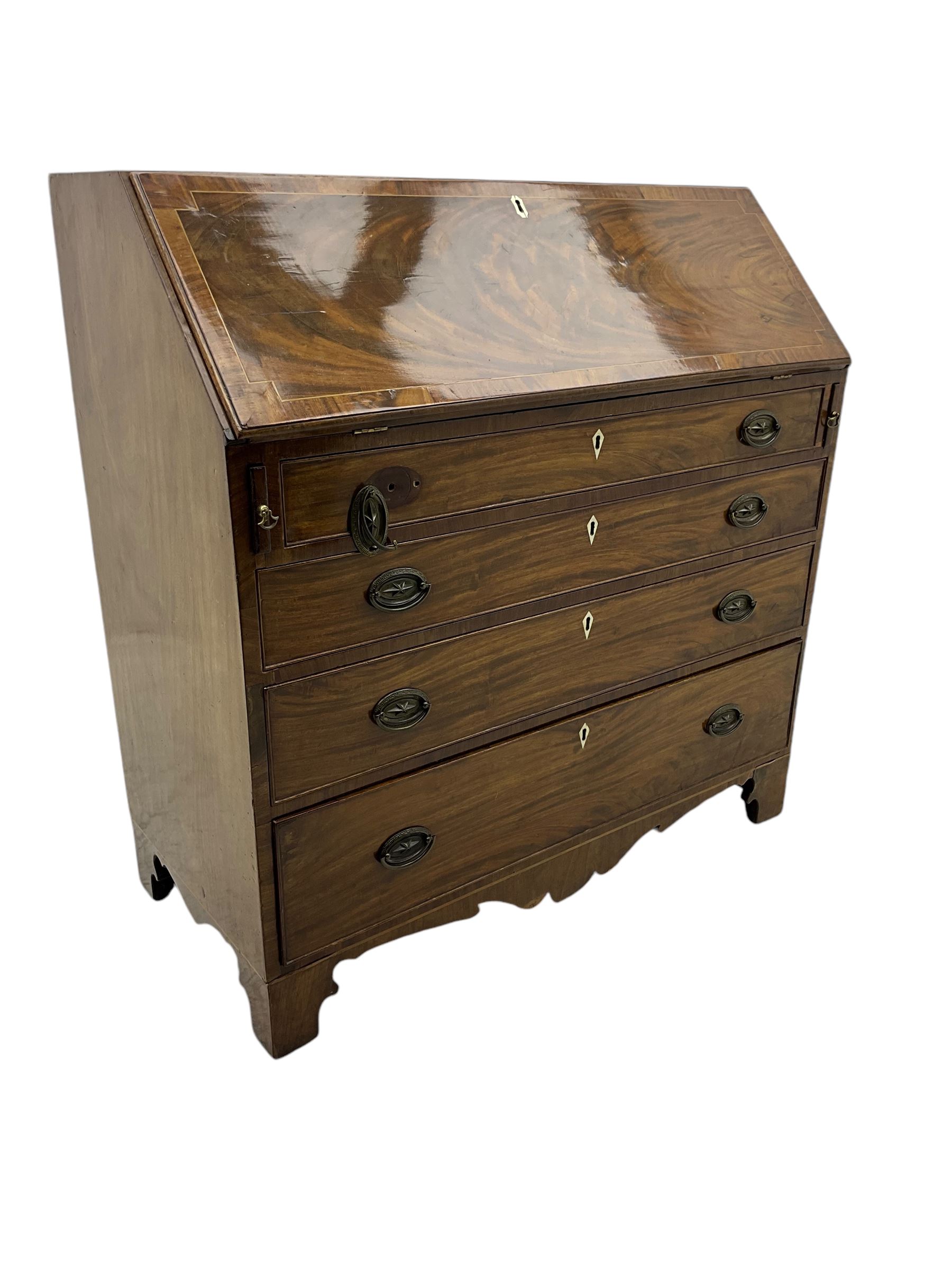 George III mahogany bureau, hinged fall front enclosing satinwood interior fitted with cupboard, drawers and pigeon holes, four long graduating cock-beaded drawers, bone escutcheons, shaped apron on bracket feet 