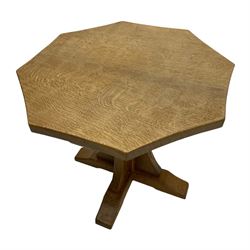 Mouseman - occasional table, adzed octagonal top, cruciform base on sledge feet, carved with mouse signature, by the workshop of Robert Thompson, Kilburn 