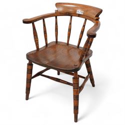 19th century elm and beech Captain's chair, curved back and arms over spindle supports, dished seat on turned supports united by double H-stretcher 