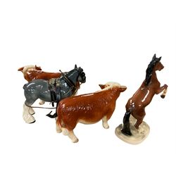 Two ceramic bulls, and two ceramic horses, tallest H27cm