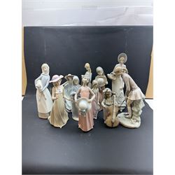 Group of Lladro figures, to include May Dance no 5662, examples modelled as a female golfer, young woman holding sheep in her arms, pair of figures in pink dressed holding sun hats, etc., together with two Nao figures and a further Spanish example, (11)