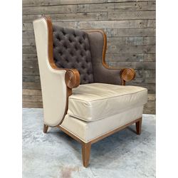 Walnut finish framed wing back armchair upholstered leather and buttoned fabric