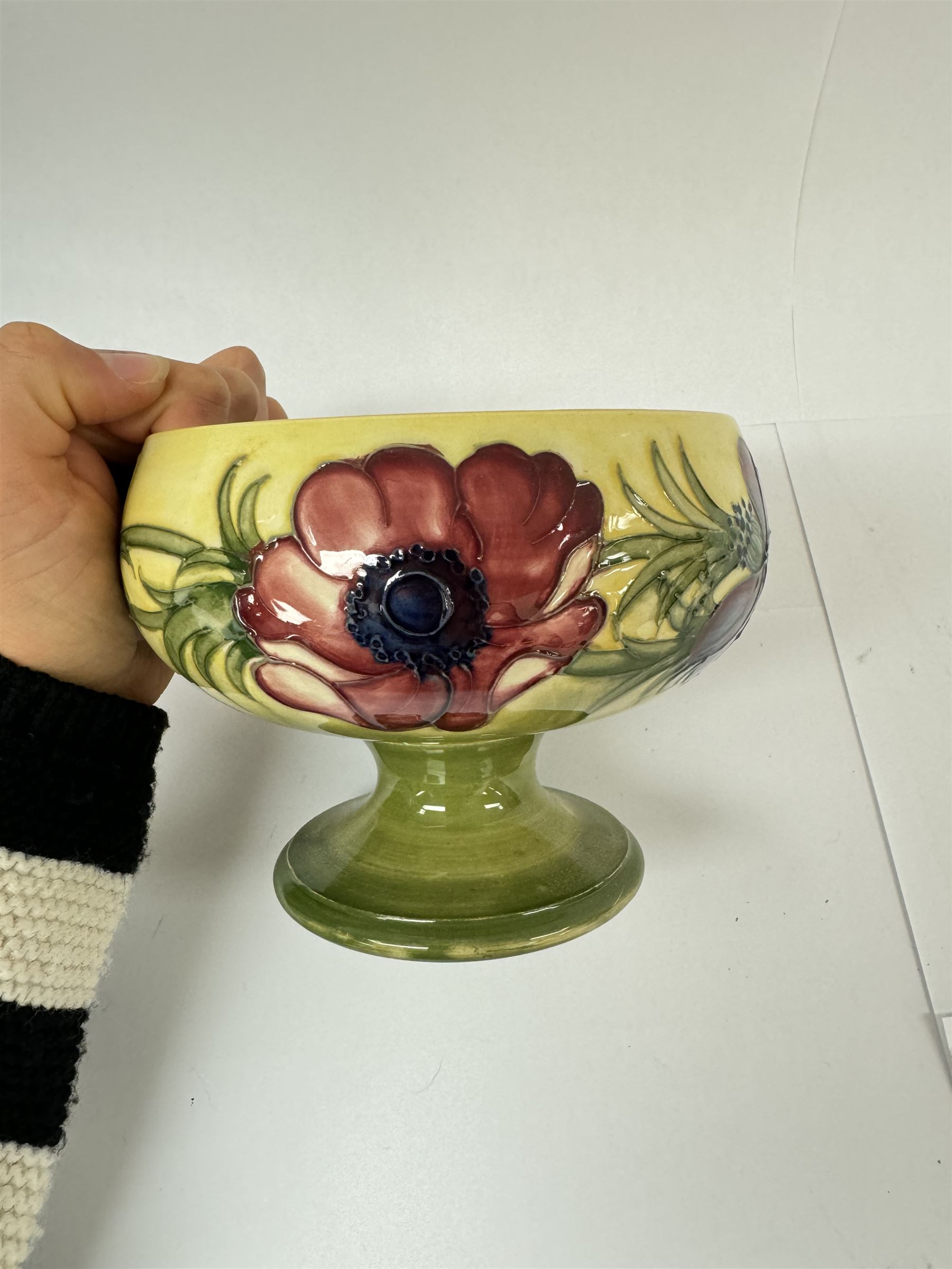 Moorcroft bowl in Clematis pattern, together with Moorcroft pedestal bowl in Anemone pattern both with makers mark below, pedestal dish H12cm 