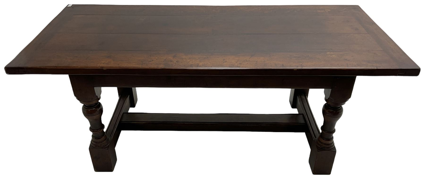 20th century oak refectory dining table, rectangular cleated top on turned supports joined by H-stretcher