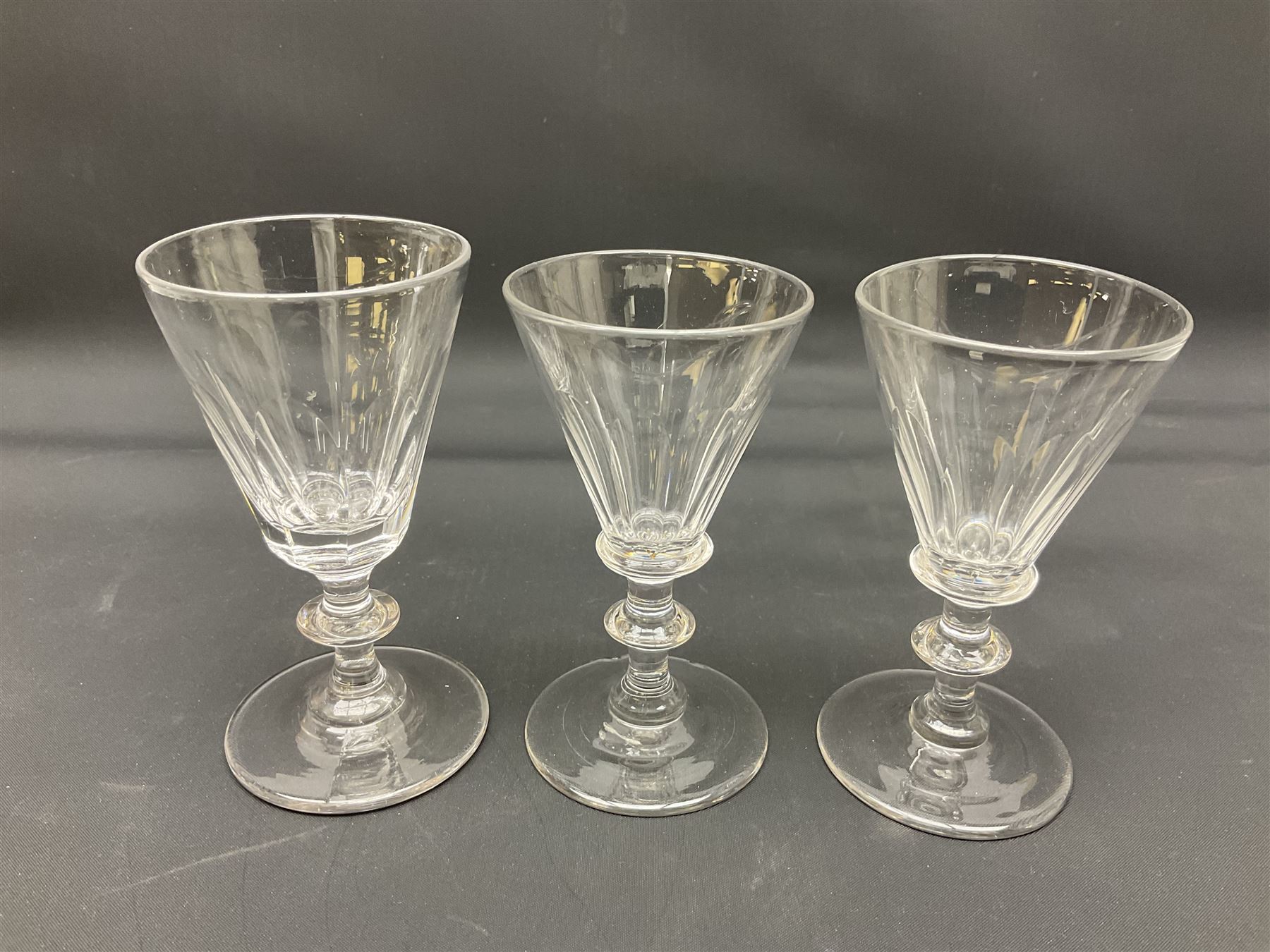 Collection of 18th century and later glassware, including set of three with twist stems and etched and fluted examples