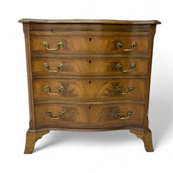 George III design mahogany serpentine chest, moulded top over brushing slide and four cock...