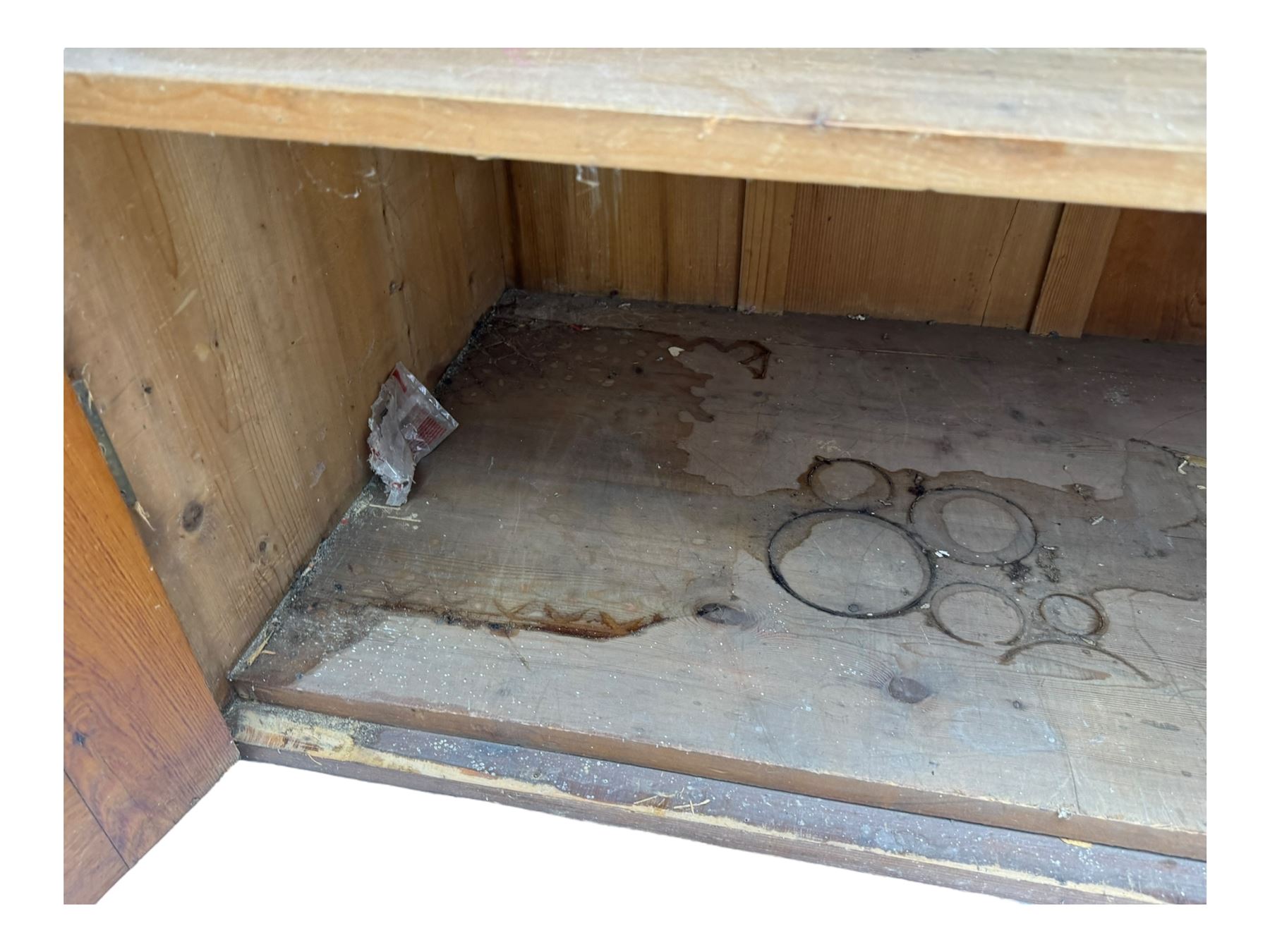 Large 19th century pine cupboard, rectangular top over two panelled later doors, enclosing four open shelves, on plinth base