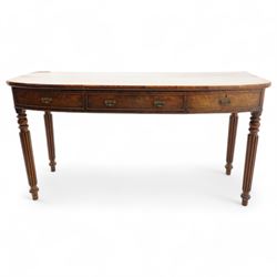 Regency mahogany bow-fronted serving table, fitted with three drawers each with figured fr...