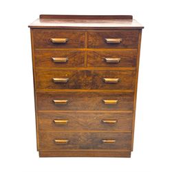 Early 20th century walnut chest, fitted with four short and four long drawers, on recessed plinth base