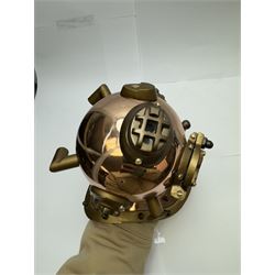 Copper novelty miniature diving helmet, together with underwater camera, helmet H20cm