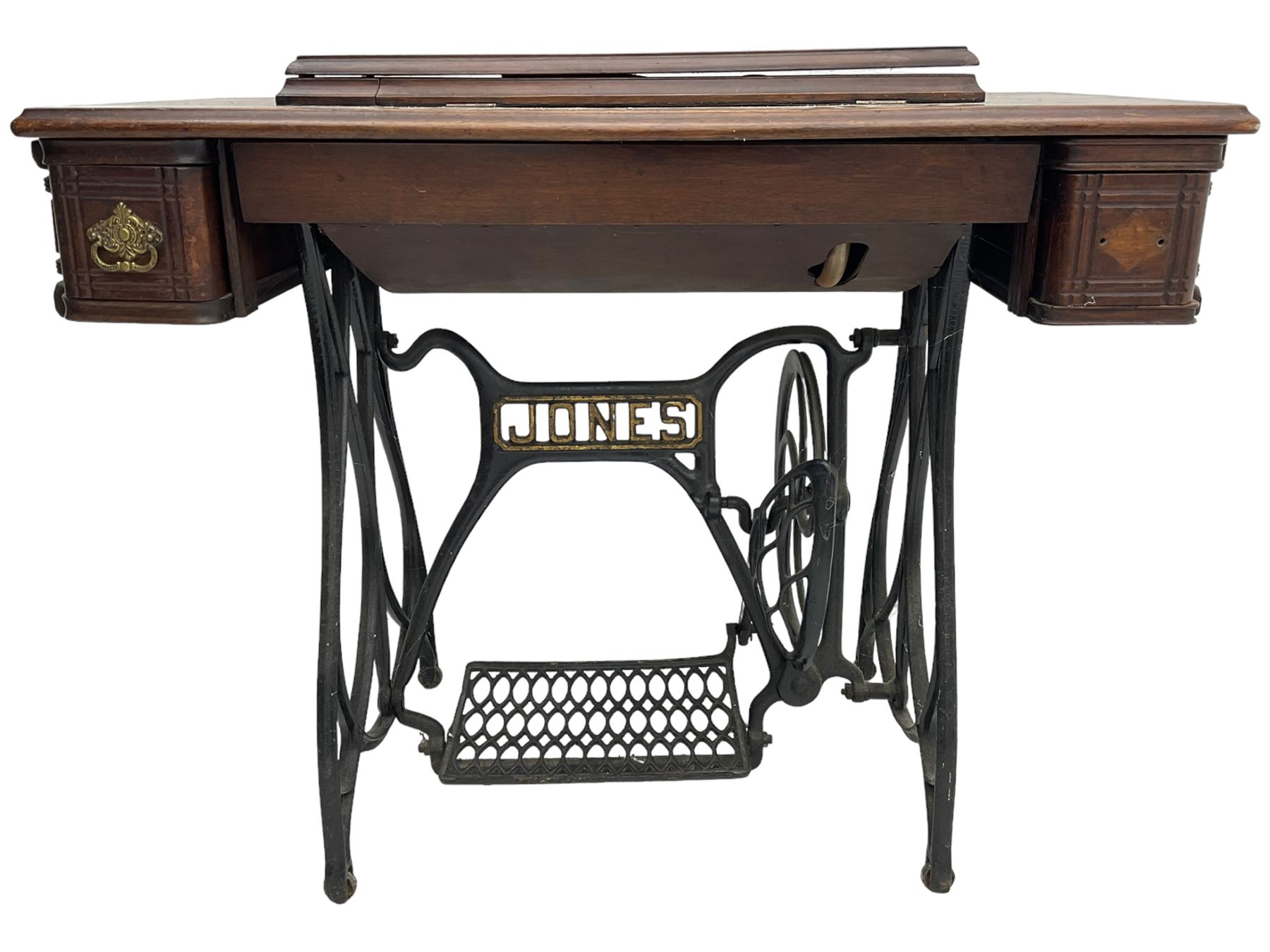 Early 20th century Jones treadle sewing machine table, bevel edged rectangular top with hinged lid enclosing sewing machine no. 480760, supported by cast iron treadle base