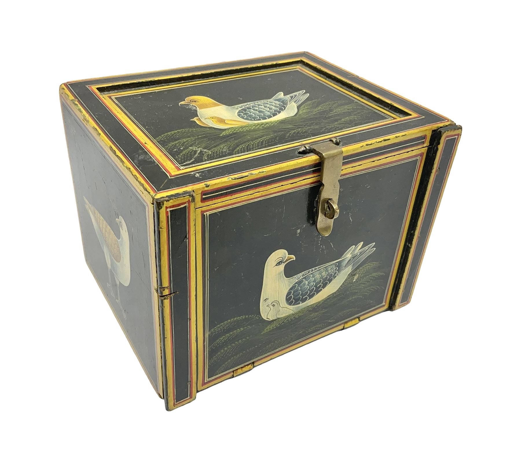 Small wooden collectors chest, painted to each side with birds upon a black ground within red and yellow borders, opening to reveal a compartmentalised interior containing one long drawer above two smaller drawers, H13cm, W18cm, D14.5cm