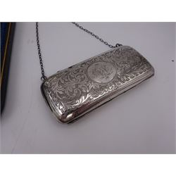 Early 20th century silver mounted coin purse, decorated with C scrolls and foliage with initials engraved to centre, with compartmentalised leather interior and finger chain, hallmarked Chester 1915, makers mark indistinct, together with a set of six early 20th century teaspoons, with reed and ribbon borders, hallmarked Cooper Brothers & Sons Ltd, Sheffield 1914
