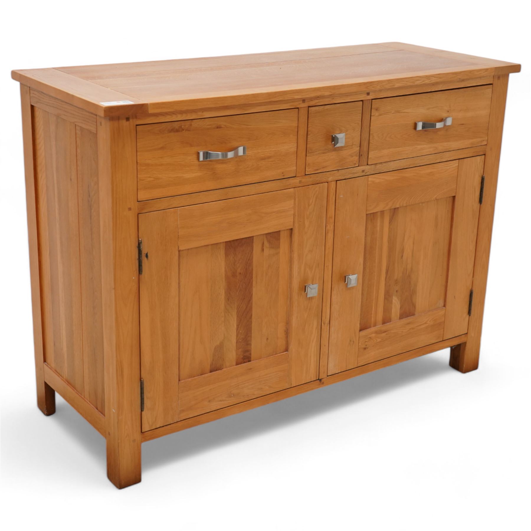 Light oak sideboard, fitted with three drawers and two cupboards