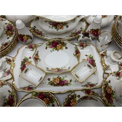 Royal Albert Old Country Roses pattern coffee service for six, comprising coffee pot, milk jug, cups and saucers, cake plate, together with miniature teapot, six teacups and saucers, six dinner plates, six side plates etc 