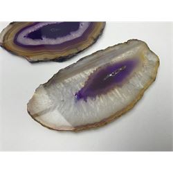 Three purple agate slices, polished with rough edges, of various sizes largest H7cm, L10cm