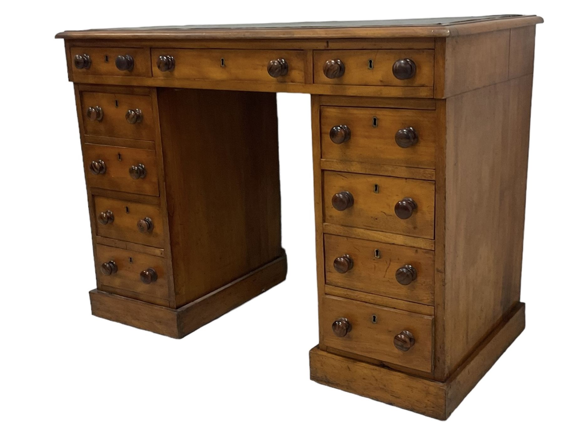 Victorian mahogany twin pedestal desk, rectangular top with inset green leather writing surface, fitted with central frieze drawer flanked by five graduating drawers on each side 