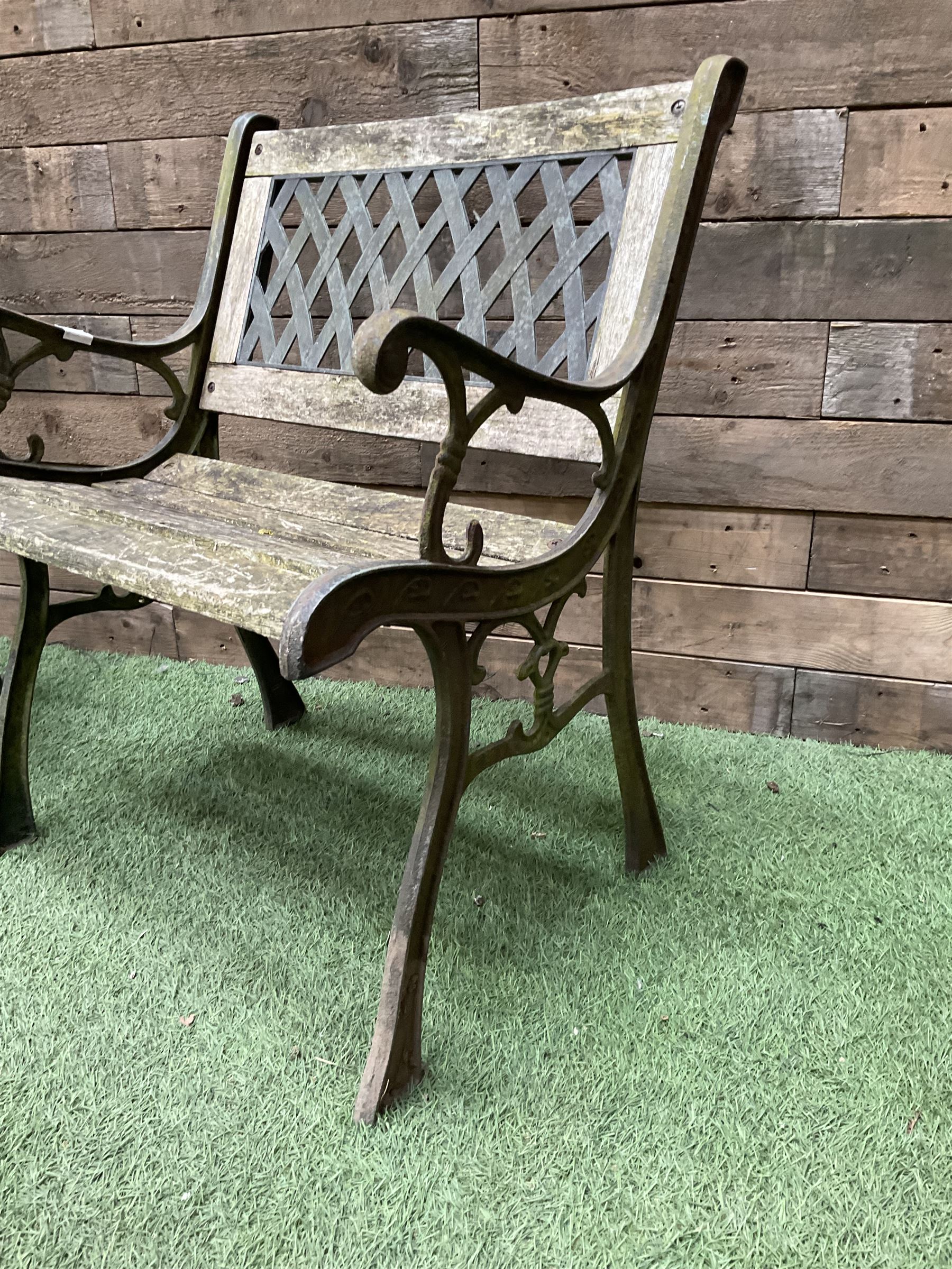 Pair of cast iron and wood slatted garden bench seats - THIS LOT IS TO BE COLLECTED BY APPOINTMENT FROM DUGGLEBY STORAGE, GREAT HILL, EASTFIELD, SCARBOROUGH, YO11 3TX