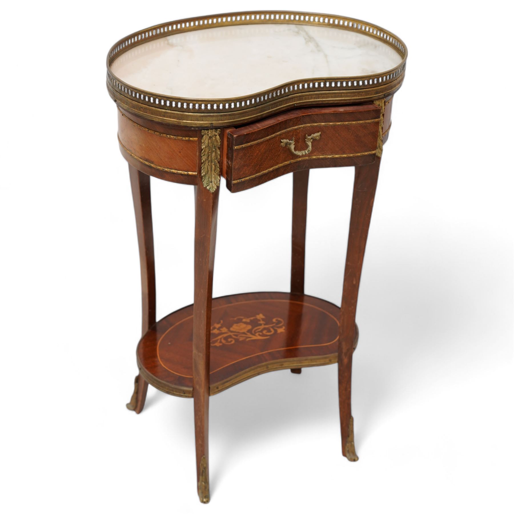 Early 20th century French walnut kidney-shaped occasional table, white marble top with raised pierced brass gallery, fitted with single frieze drawer, flanked by acanthus shaped gilt metal mounts, raised on cabriole supports united by a floral inlaid under-tier