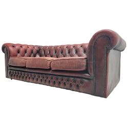 Chesterfield three-seat sofa upholstered in red buttoned leather