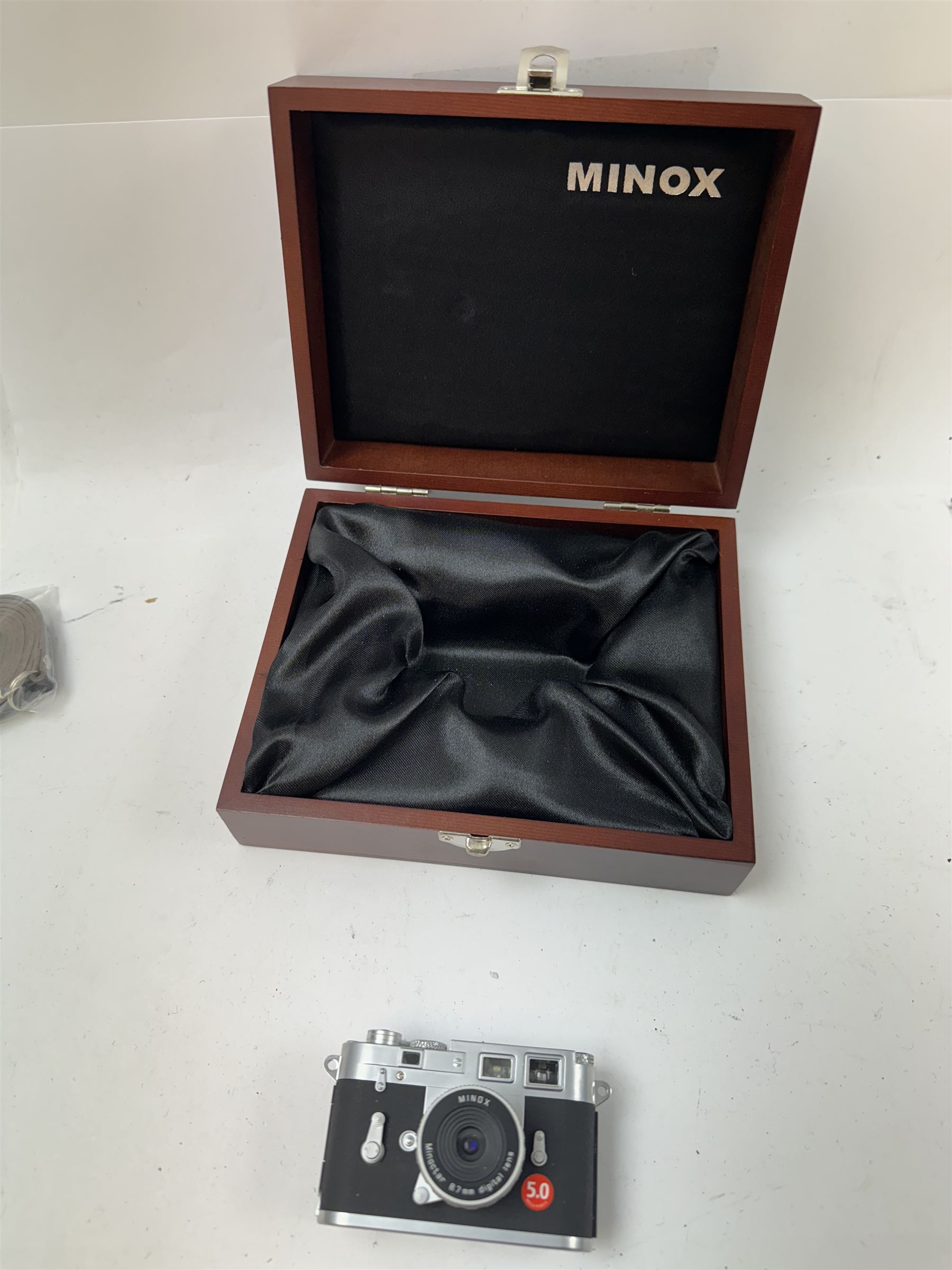 Minox DCC Leica M3 Digital Classic Camera 5.0, serial no. 89089784, a miniature reproduction of a Leica M3 rangefinder camera, with instructions, wood effect presentation box, strap and other accessories