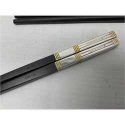 Set of eight silver plated ebony chopsticks by Christofle France, in presentation case