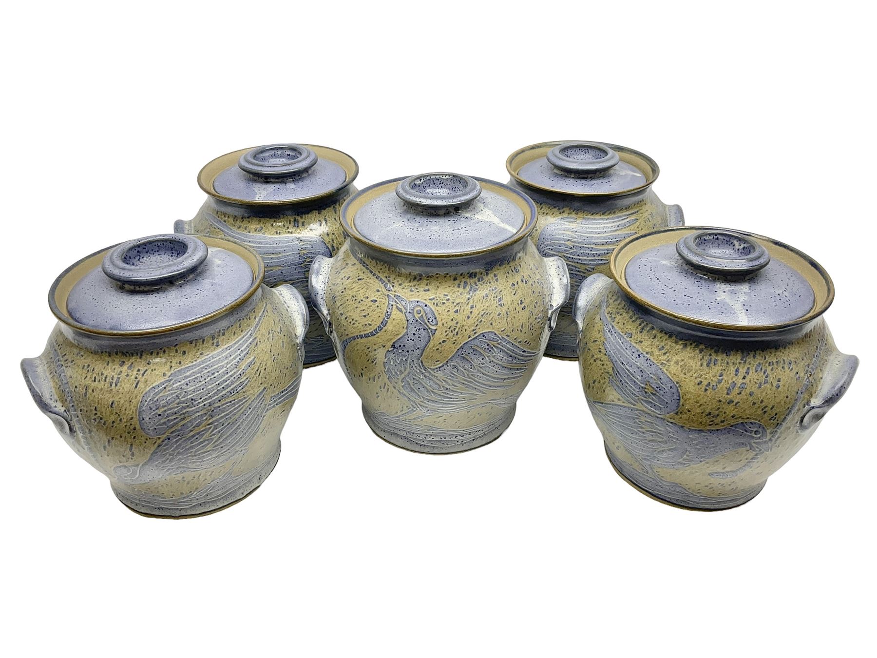 John Egerton (c1945-): set of five studio pottery stoneware twin handled jars with covers, decorated with blue birds upon a brown mottled ground, H20cm