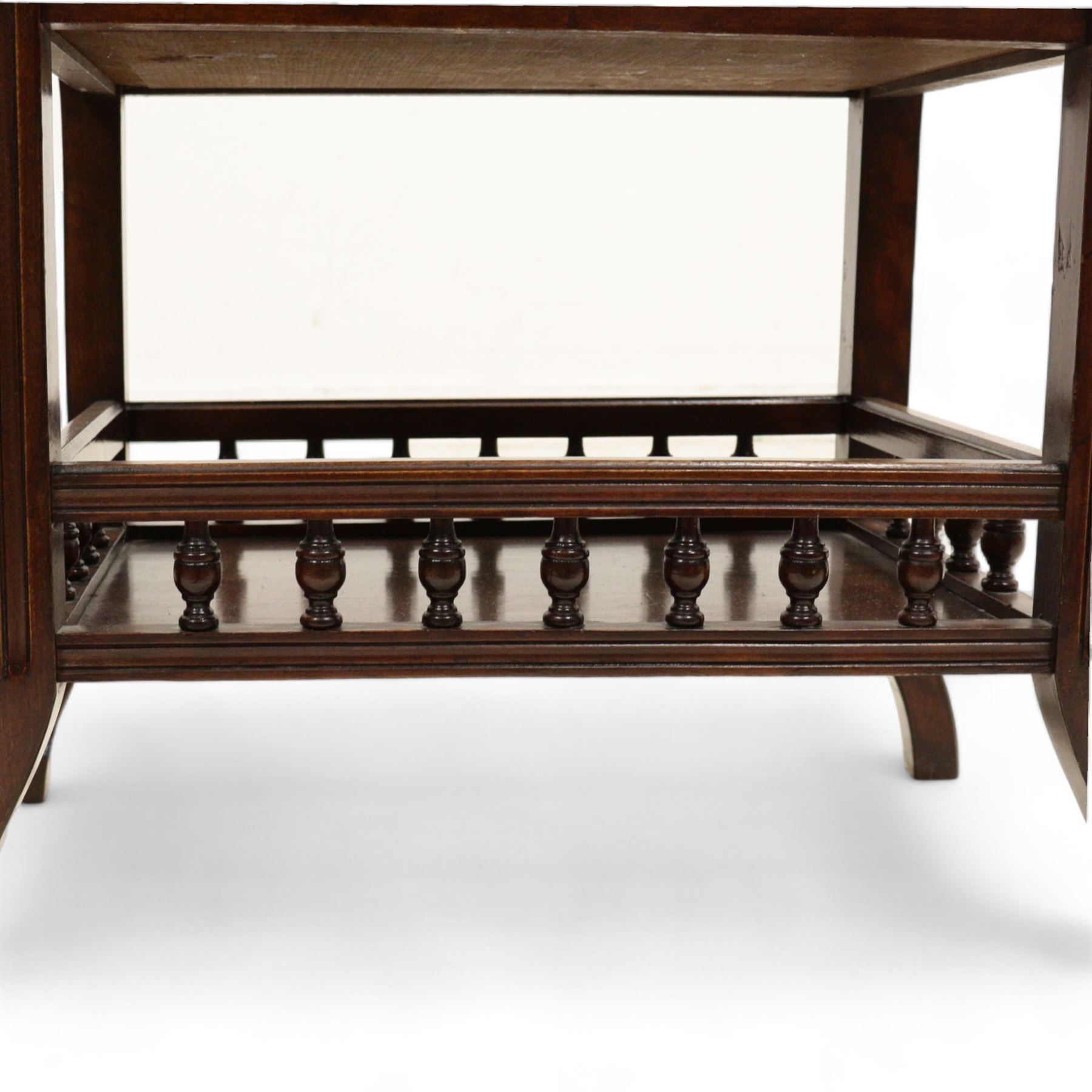 Late Victorian walnut piano stool, hinged upholstered seat enclosing storage space flanked by turnings, on S-scroll carved supports terminating to splayed feet, united by galleried undertier 