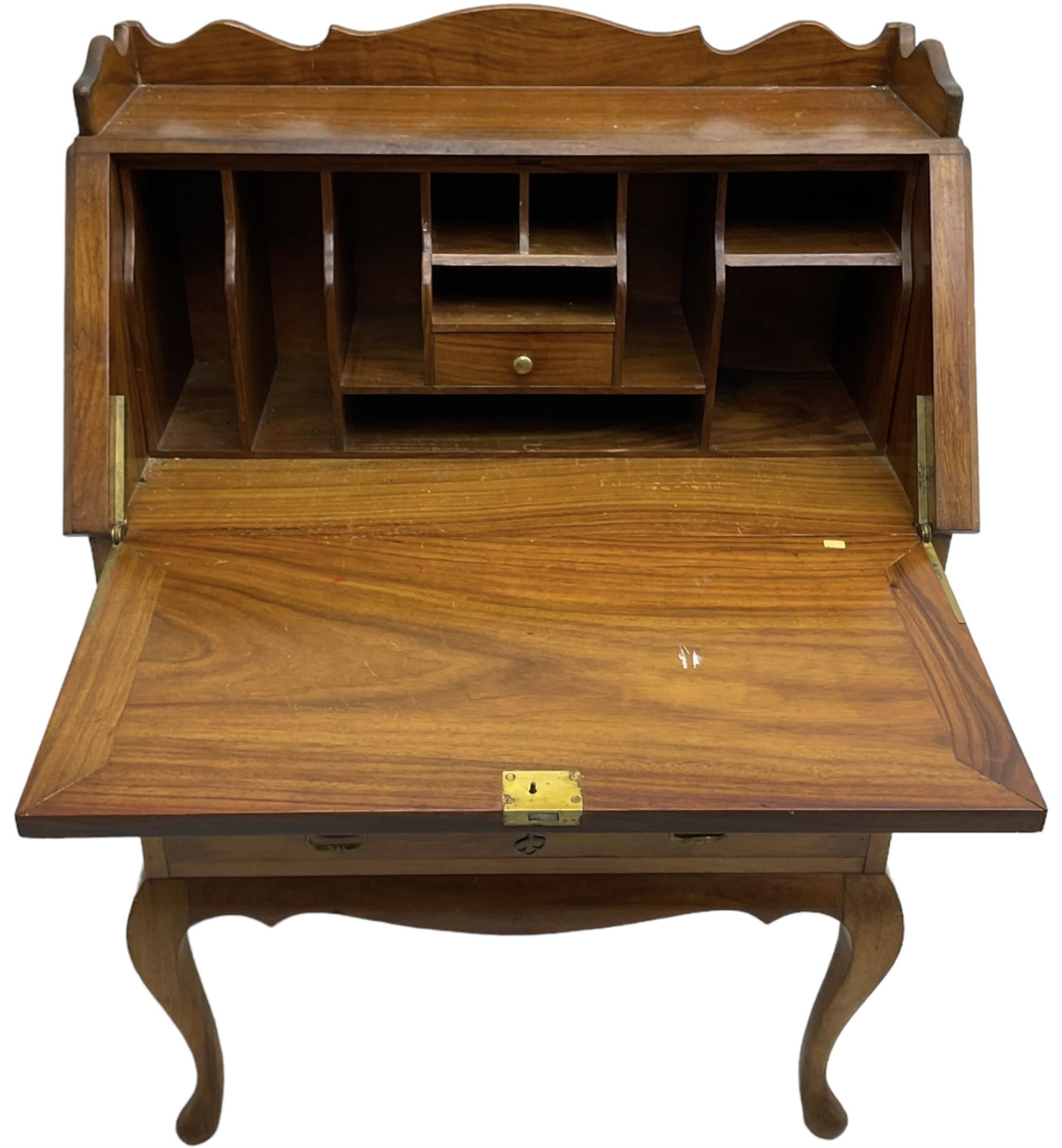 Inlaid hardwood bureau, shaped raised back over fall front inlaid with brass scrollwork, four short over one long drawer, on cabriole supports  