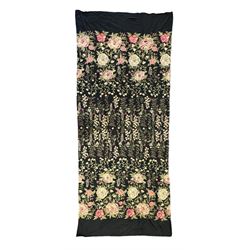 Embroidered Karandi fabric runner, the field featuring a black ground with an all-over floral design, including large pink and cream roses, accompanied by green leaves and small blossoms, bordered by plain sections at each end