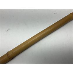 Bamboo cane torch, the pierced brass cover opening to reveal a wick, H144cm