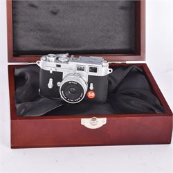 Minox DCC Leica M3 Digital Classic Camera 5.0, serial no. 89089784, a miniature reproduction of a Leica M3 rangefinder camera, with instructions, wood effect presentation box, strap and other accessories