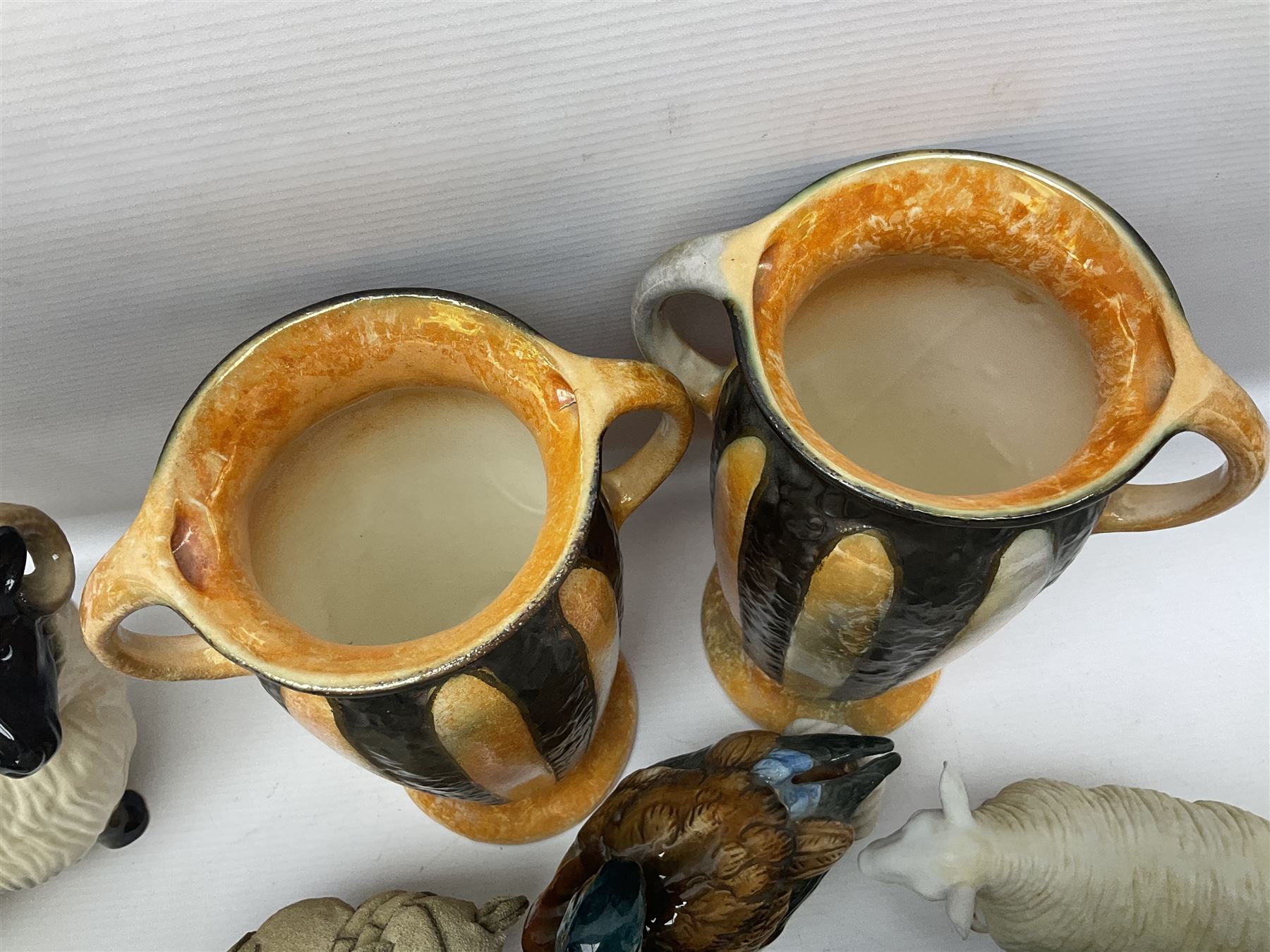 Two Hornsea Fauna vases, together with a similar jug, Coopercraft sheep and other collectables  