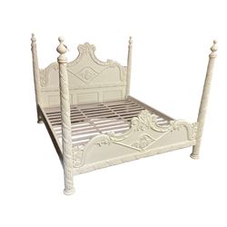 French design white finish 6' Super Kingsize four poster bed, shaped head and footboards decorated with flower heads and scrolled foliage, finialed reed moulded upright posts with intertwined ribbon