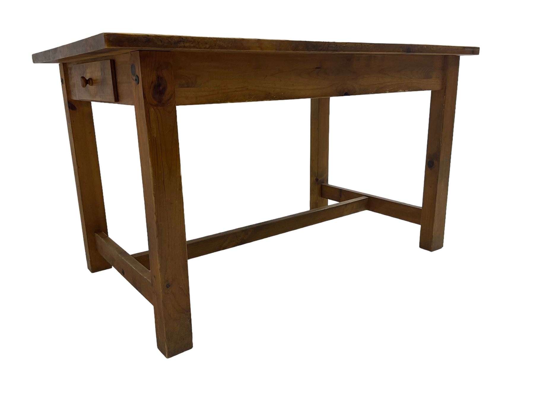 Traditional waxed pine kitchen or dining table, rectangular top over square supports united by H-stretcher