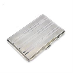 1940s silver cigarette case, with engine turned decoration and black rectangular cartouche...