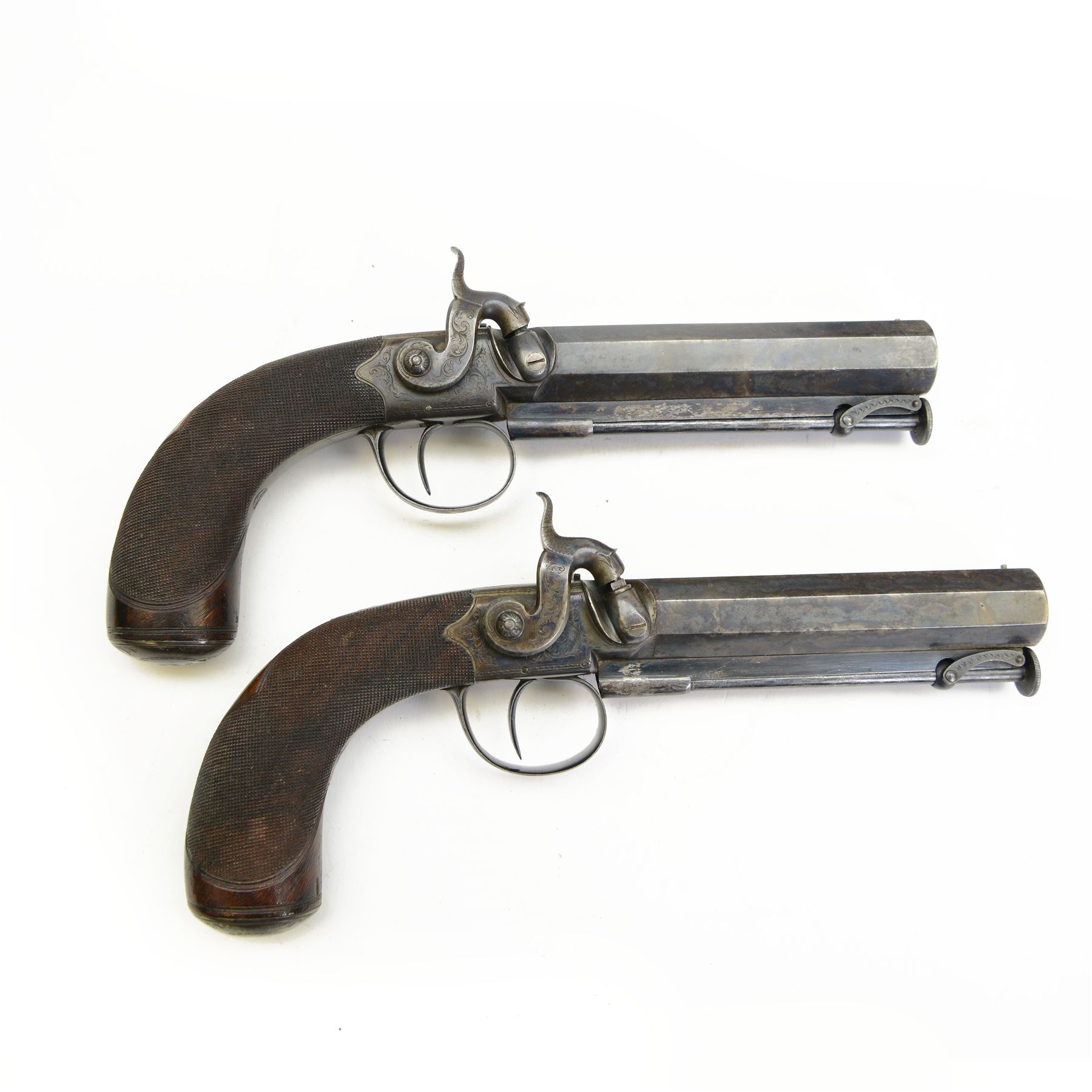 Pair of English officer's percussion cap belt pistols, cased, circa 1840, by Charles and Henry Egg, with 15 bore octagonal barrels engraved C & H Egg to the top, chequered walnut grip, swivel ramrods beneath, in a brown velvet lined fitted burr walnut case, with all accessories, including powder flask, bullet mould, key etc
Charles and Henry Egg were the sons of Joseph Egg, successor to Joseph Manton & Son of London 
This item has been registered for sale under Section 10 of the APHA Ivory Act 