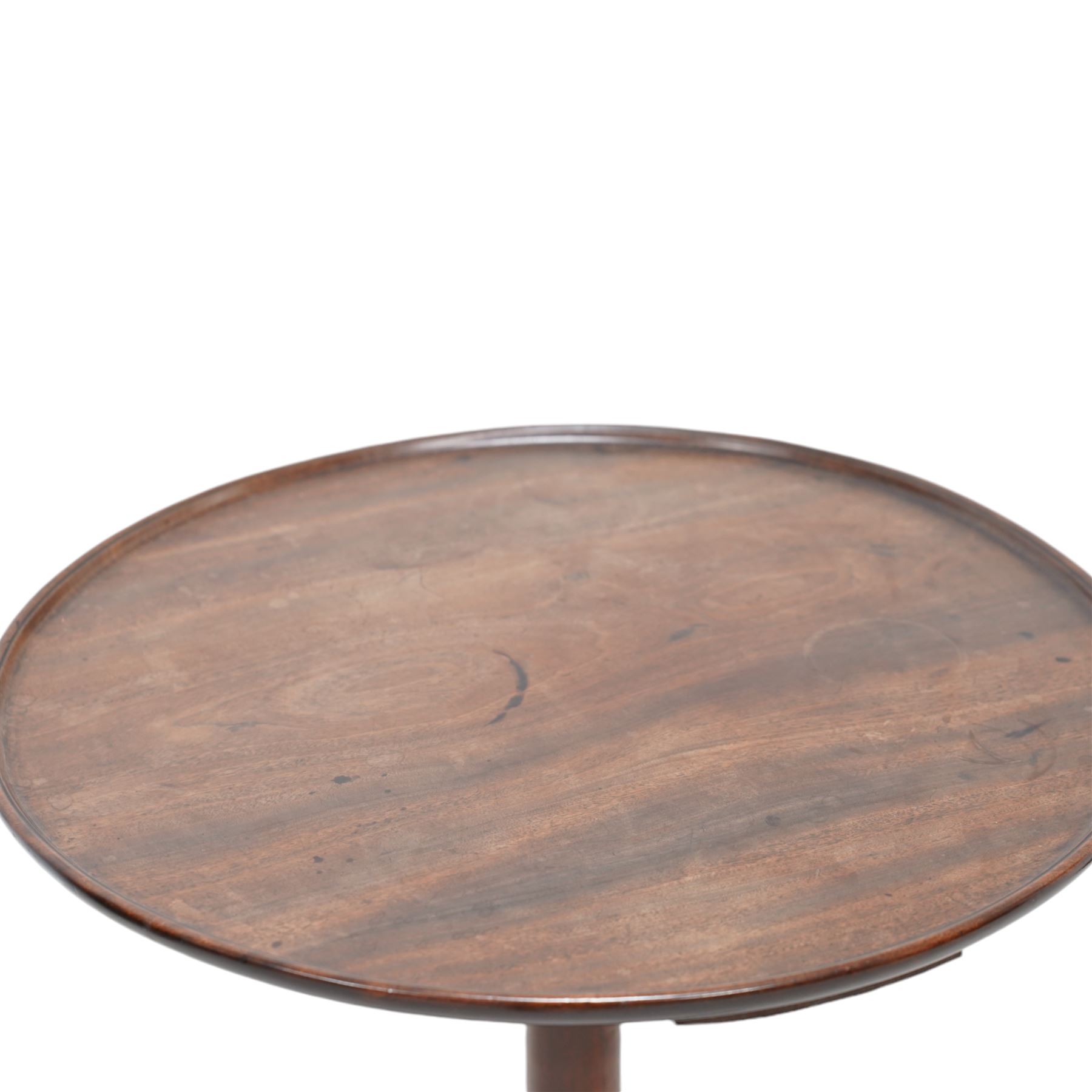 George III mahogany wine table, the circular dished top raised on a turned pedestal, terminating to a tripod base with splayed supports 