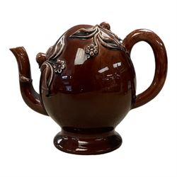 Brameld Cadogan Pottery Teapot, decorated in a brown glaze and applied with trailing fruit...